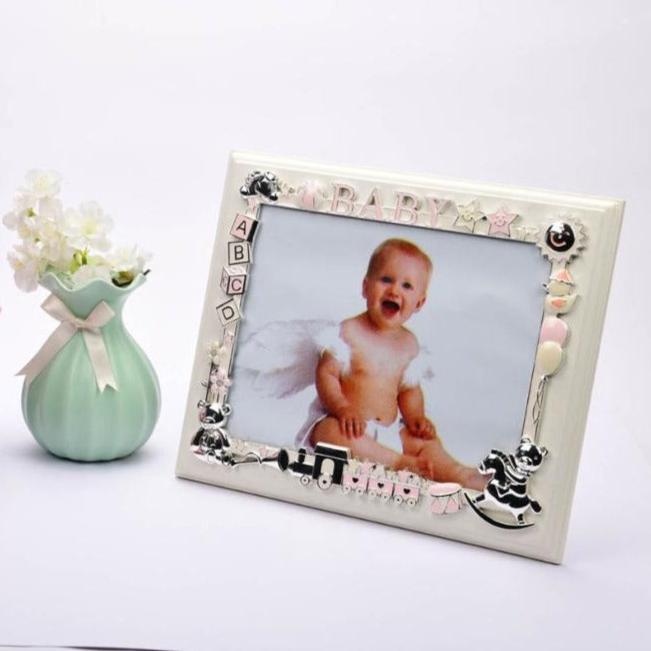 Photo frame with train and baby