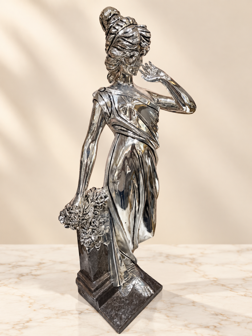 Silver Cladded Lady Statue with Flowers