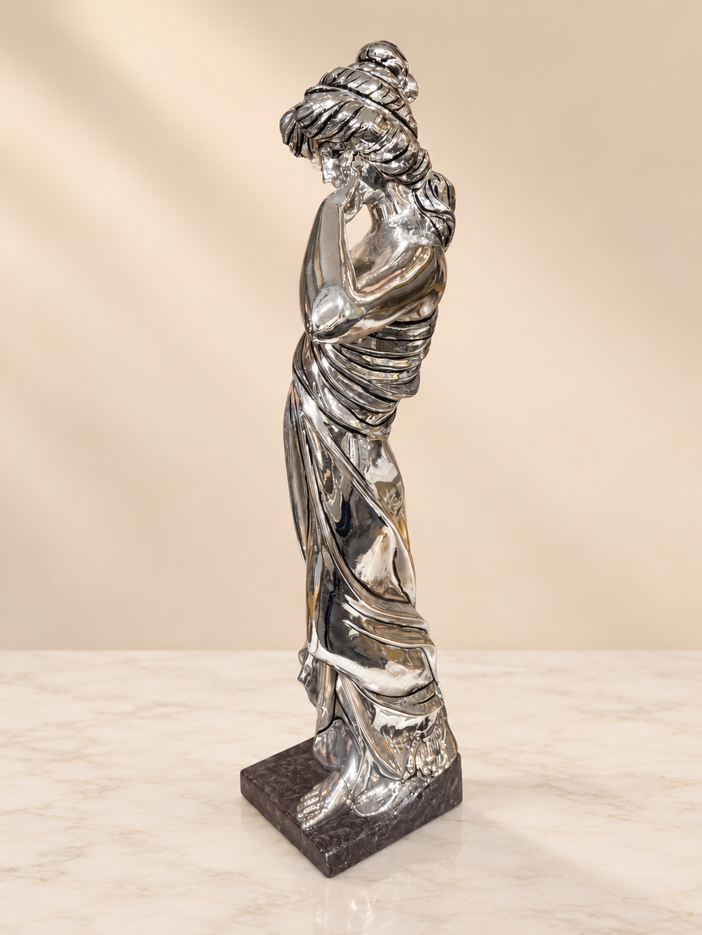 Silver Cladded Lady Statue with Flowers