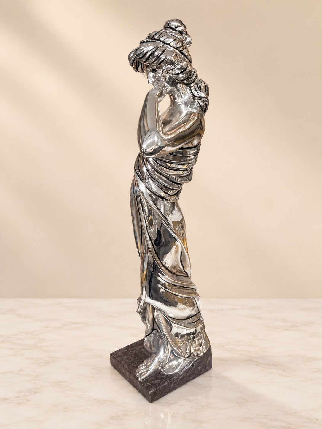 Silver Cladded Lady Statue with Flowers